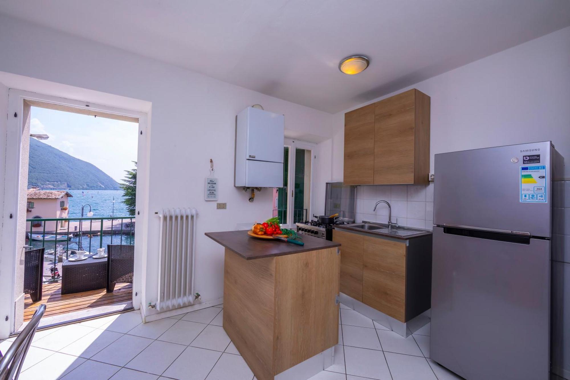 Dogana Best Lake View - Happy Rentals Torbole Sul Garda ภายนอก รูปภาพ